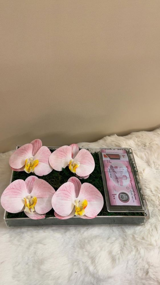 Orchid money arrangement 